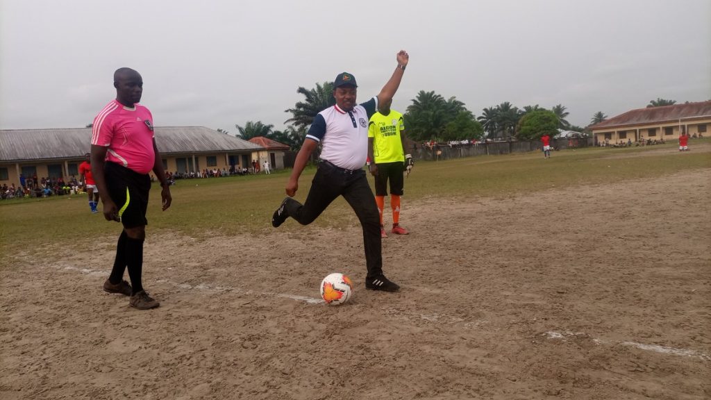 Hon. Ekoakwaha Etteh performing the kickoff at the finals of Rt. Hon. Okpolupm Etteh Unity Cup (PHOTO CREDIT: Nsidibe Akpan)