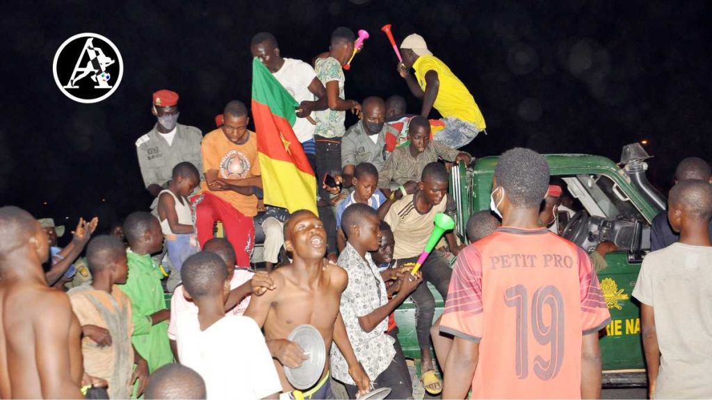 Young Cameroonians celebrating in the streets of Garoua as Vincent Abubakar helped the Indomitable Lions book their place in the knockout stage of the 2021 Africa Cup of Nations (PHOTO CREDIT: Jimoh Otisoro) 