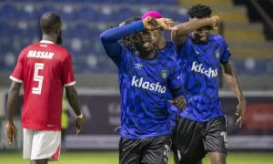 Junior Lokossa and Sporting Lagos players celebrating their win against Niger Tornadoes