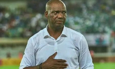 Super Eagles’ caretaker coach, Augustine Eguavoen, has offered insights into his decision to bench Victor Osimhen and Taiwo Awoniyi during Nigeria’s goalless AFCON 2025 qualifier against Rwanda, as reported by Soccernet.ng. Despite Osimhen being the reigning African Player of the Year, he started the game from the sidelines for the second consecutive match. Eguavoen opted to bring him on as a substitute in the second half, replacing Victor Boniface. Osimhen, who recently joined Galatasaray on loan, struggled to make an impact, unlike his previous game against Benin, where he found the net. Osimhen’s Fitness Concerns In the post-match press conference, Eguavoen explained that his decision was influenced by Osimhen’s fitness issues after a challenging summer, which included a failed transfer to Chelsea and a falling out with Napoli. “Osimhen is our brother, you can’t throw the baby out with the bathwater. We know what he is going through in Napoli. He just moved to Galatasaray and has not been playing active football for a while now,” Eguavoen said. He further emphasized the need to manage Osimhen’s fitness carefully, stating, “We are trying to manage his fitness. He played the last 25 minutes in the previous game, and today we had a word with him that he can’t play 90 minutes or else he will get injured.” Awoniyi and Squad Rotation Eguavoen also addressed his decision to limit Taiwo Awoniyi’s playing time, explaining that squad rotation and player fitness were key factors. “Awoniyi had a few minutes at his club before joining us. We have 23 to 40 players to choose from, but only 11 can start. It’s frustrating, but the bonding is there, and everyone is on board,” Eguavoen remarked. Formation and Tactical Challenges The Super Eagles coach acknowledged the difficulty of making tactical changes given the limited preparation time, having had only a few days of training before facing Benin and Rwanda. “We trained for three or four days before the Benin game and then had to come here. It’s very difficult to change formation,” Eguavoen explained. Confidence in Qualification Despite the challenges surrounding fitness and tactics, Eguavoen expressed confidence in the Super Eagles' ability to secure qualification for AFCON 2025